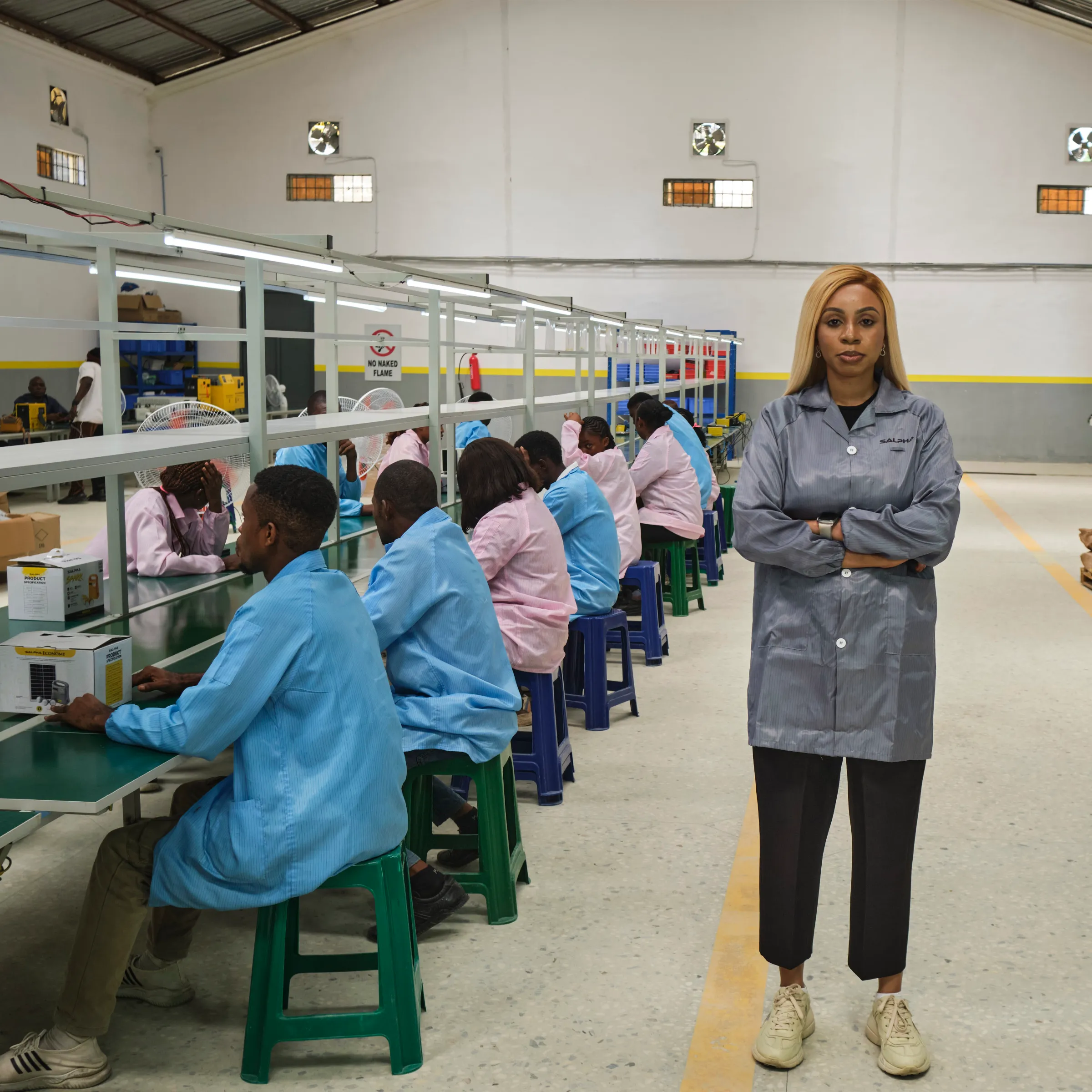Sandra Dozie, Salpha Energy founder, pictured at her solar assembly factory in Cross River, Nigeria, in 2024.  Emeka Iko/Ashden Climate Solutions/Handout via Thomson Reuters Foundation.