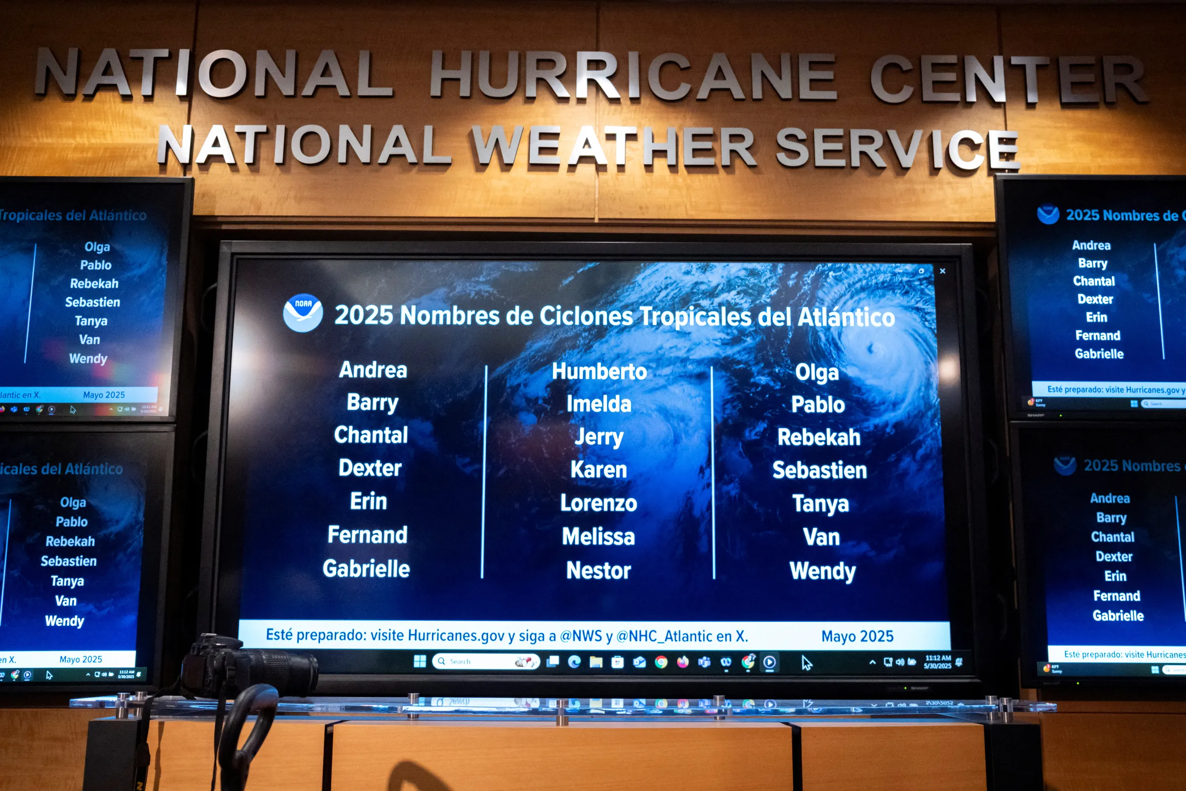 Monitors display the 2025 Atlantic Tropical Cyclones names at the National Hurricane Center (NHC) during a news conference in Miami, Florida, U.S. May 30, 2025. REUTERS/Marco Bello