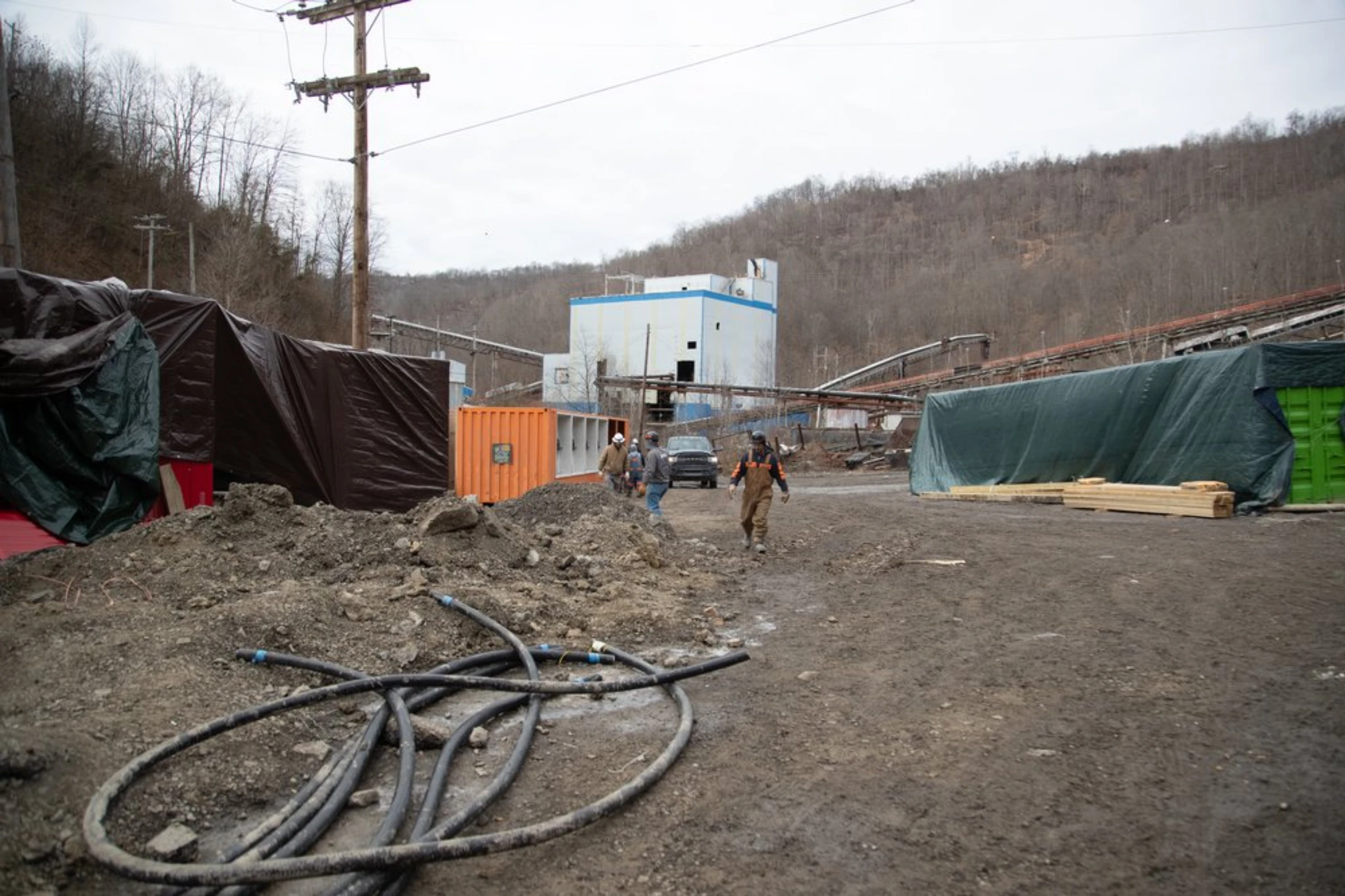 Construction workers at a Blockware Solutions operation on an old coal mining site in Belfry, Kentucky, January 24, 2022. Thomson Reuters Foundation/Amira Karaoud
