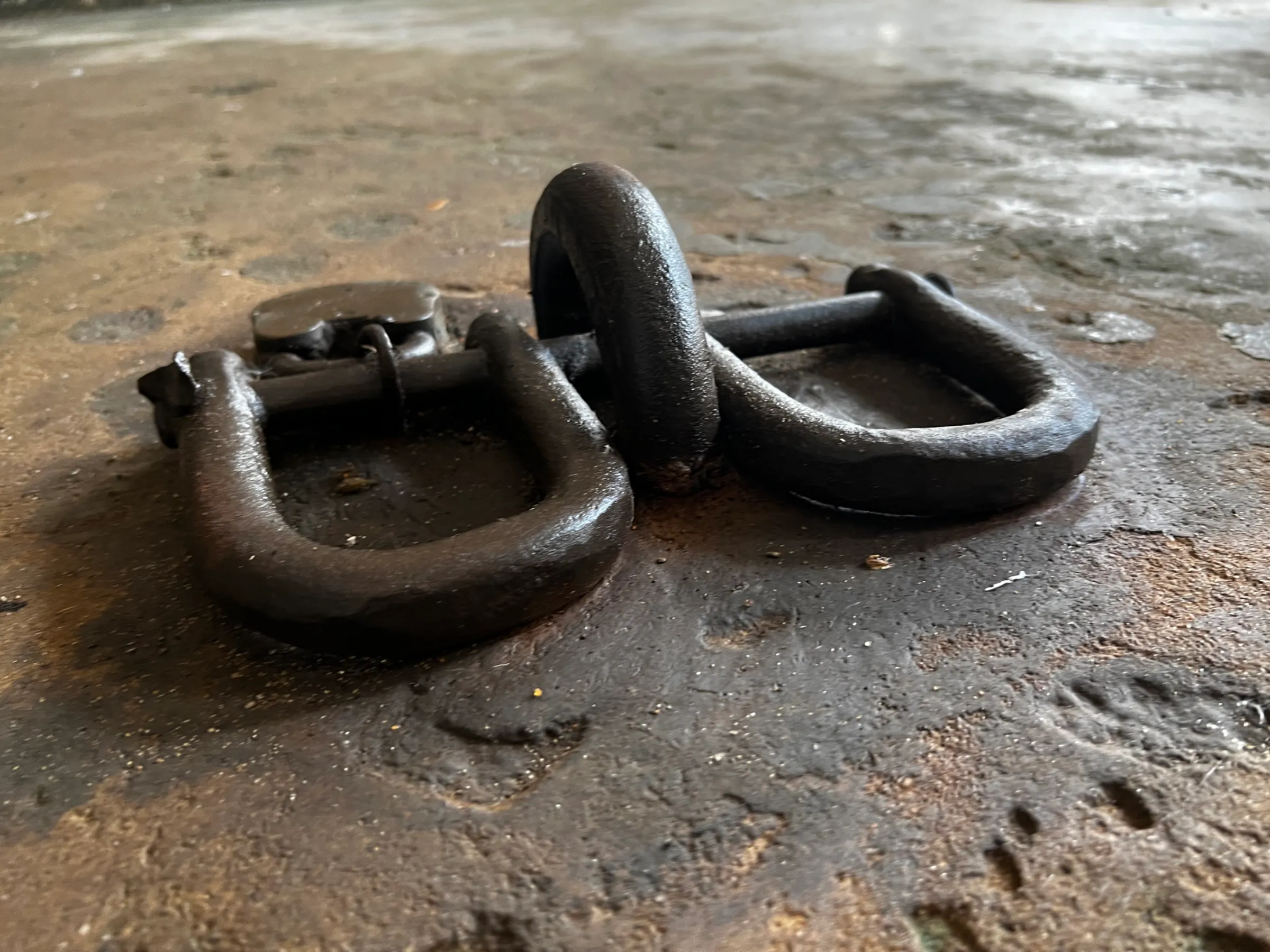 Ankle shackles used during the transatlantic slave trade at Fort Prinzenstein in Keta, Ghana on Aug 8, 2022