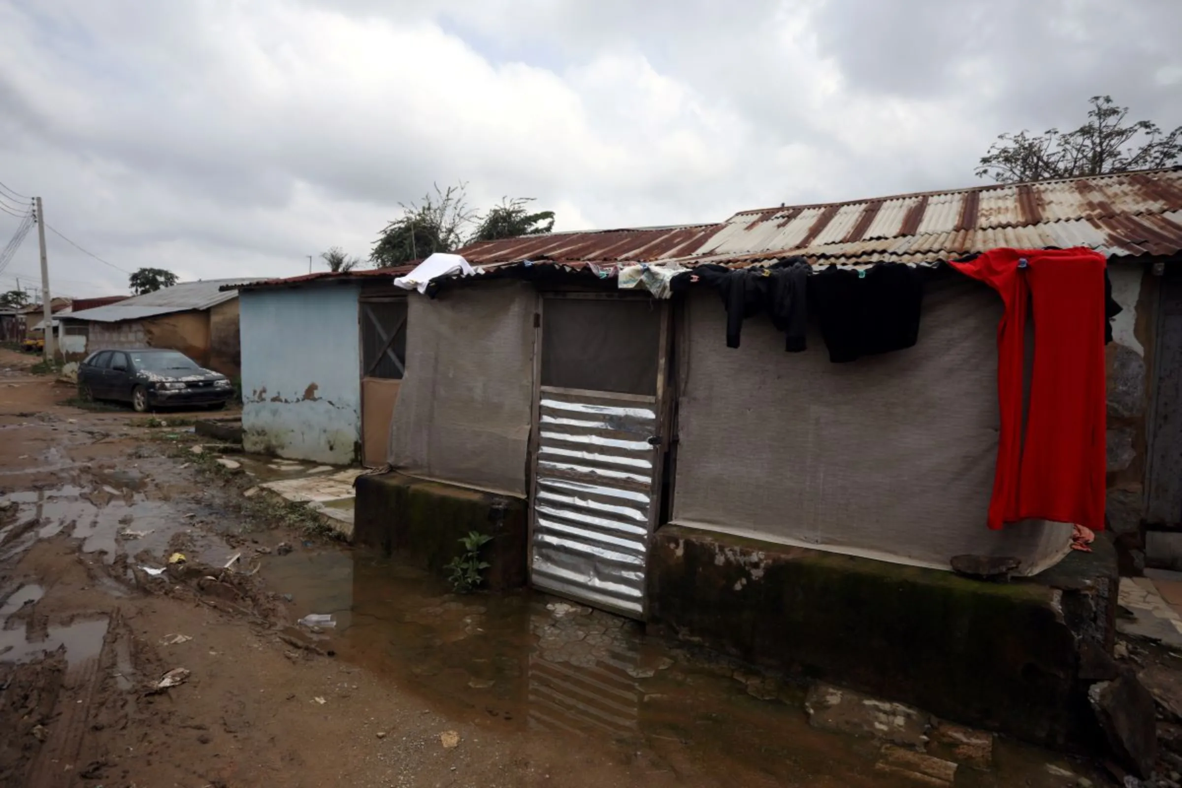 Water floods the soil near a house in one of the overpopulated settlements of Abuja,  Nigeria, September 23, 2019. REUTERS/Afolabi Sotunde