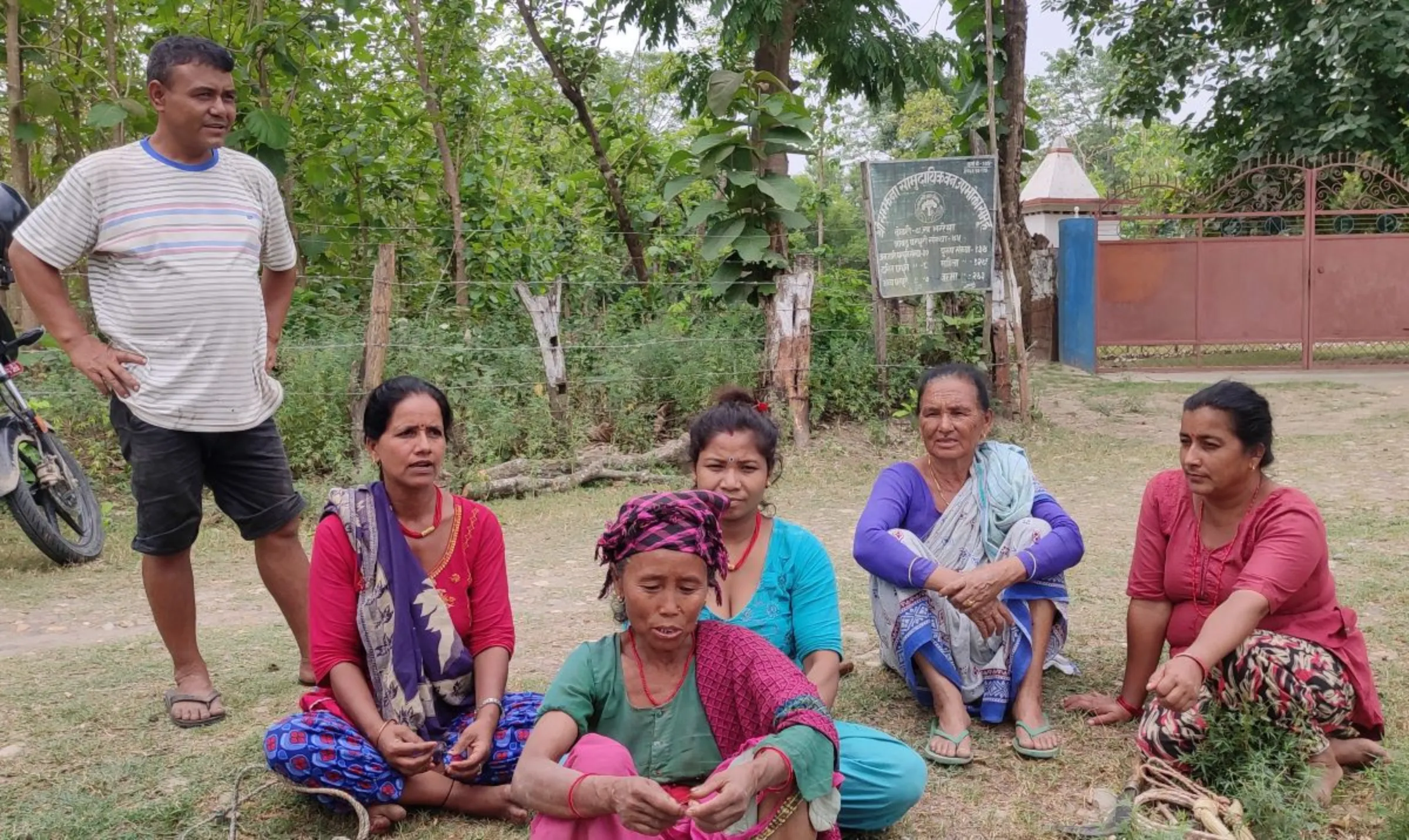 A group of women sit in the Samjhana Community Forest Bardiya, Nepal. June, 28, 2022