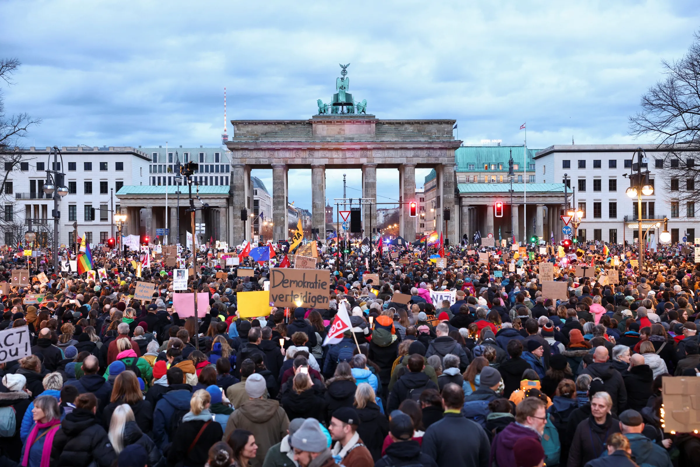 Activists take part in a demonstration entitled 'We stand together! Sea of Lights Against a Shift to the Right' against the far-right Alternative for Germany (AfD) party, at the Brandenburg Gate in Berlin, Germany, January 25, 2025. REUTERS/Liesa Johannssen