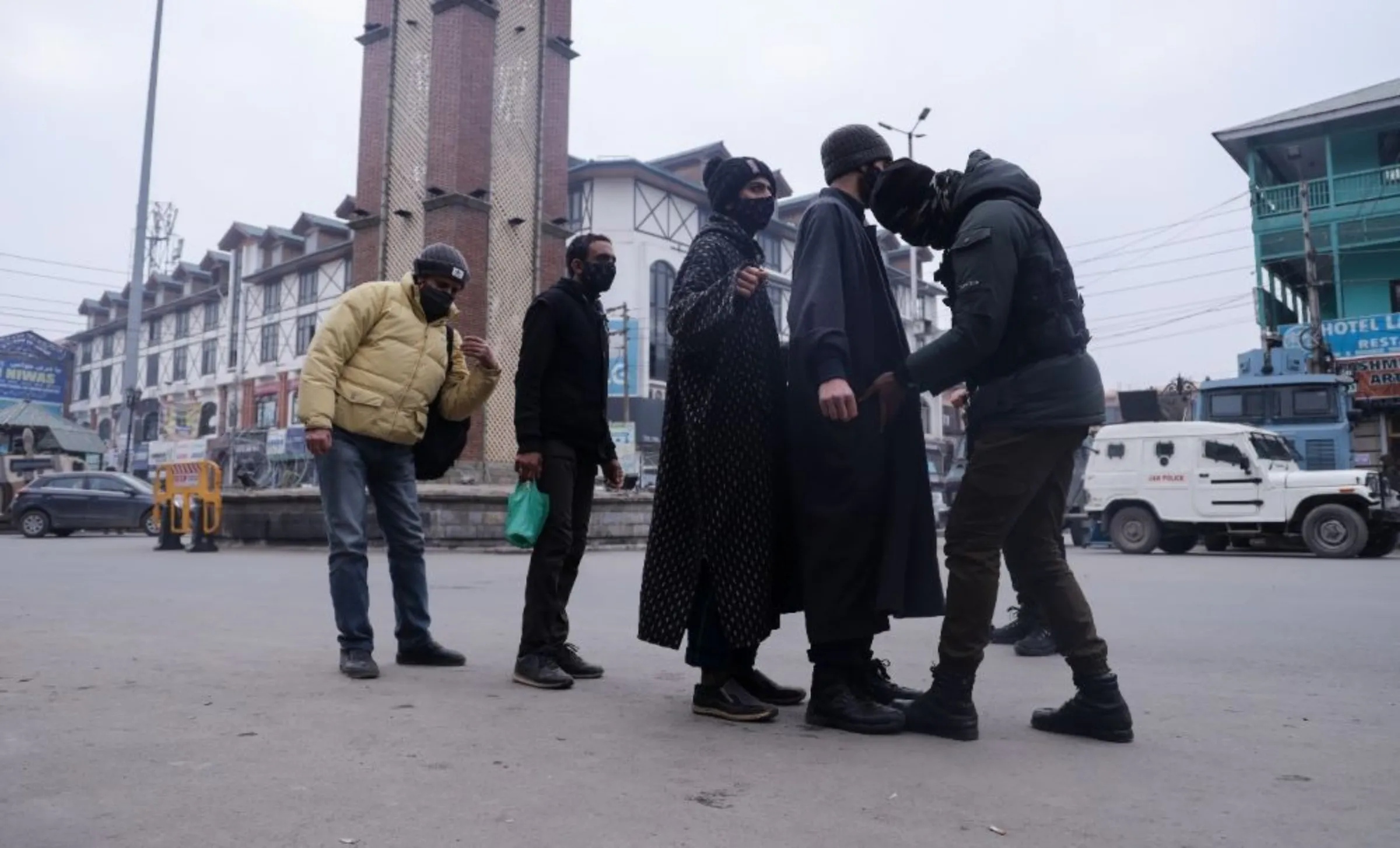 Security forces frisk and check the identification documents of residents in the Kashmiri city of Srinagar, India. January 18, ‎2022
