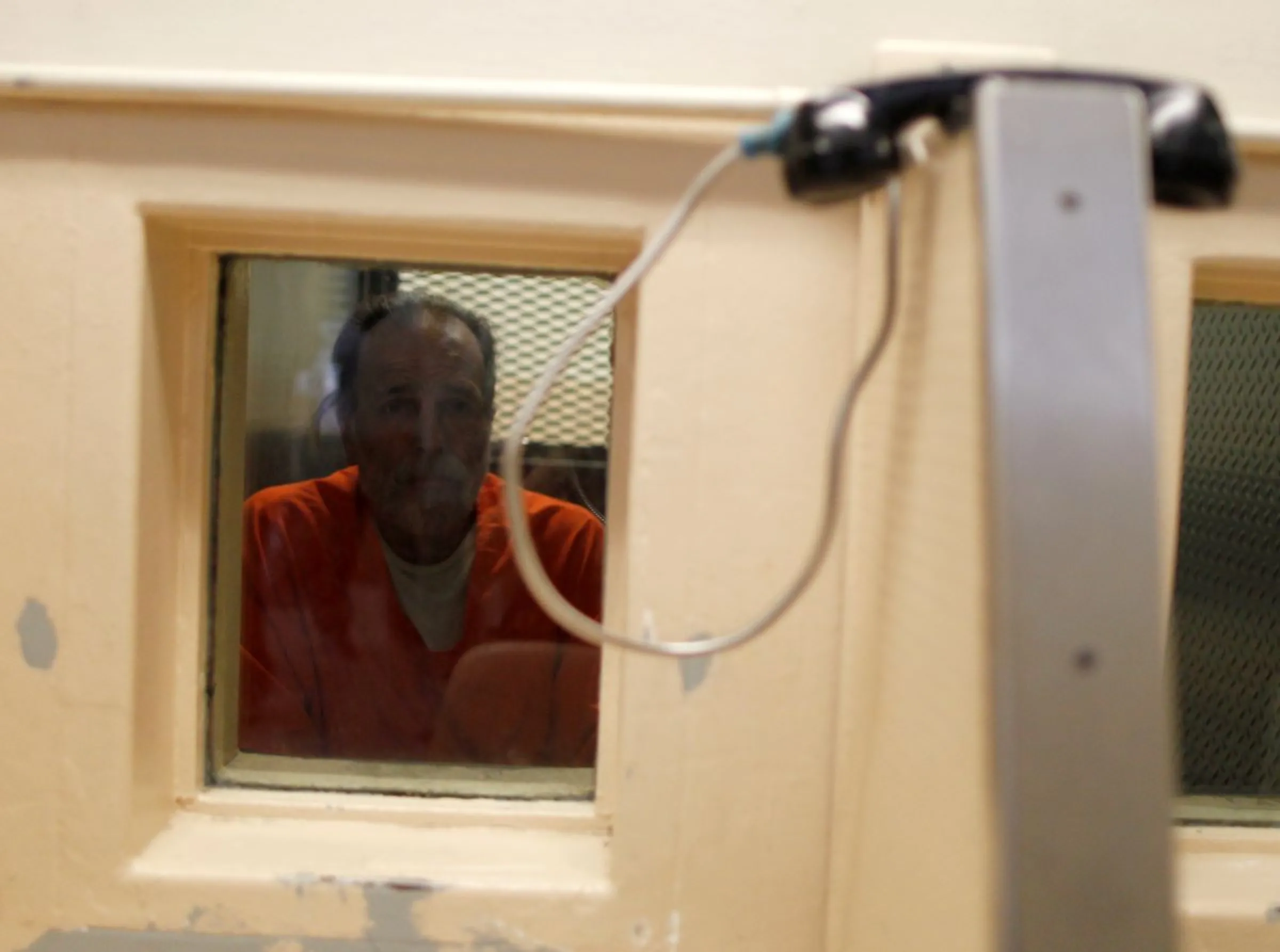 An inmate waits for a visitor at a state prison in Chino, California, June 3, 2011. REUTERS/Lucy Nicholson