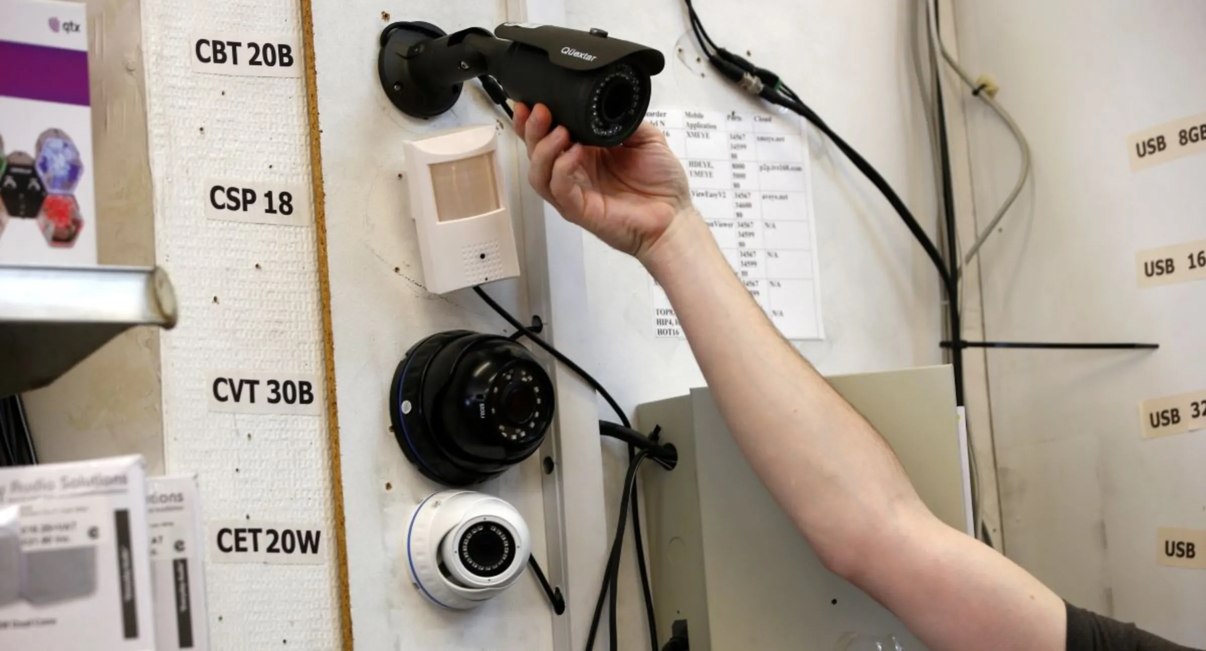 A range of CCTV cameras are displayed inside a general electronics shop in north London, Britain, May 31, 2018. REUTERS/Henry Nicholls