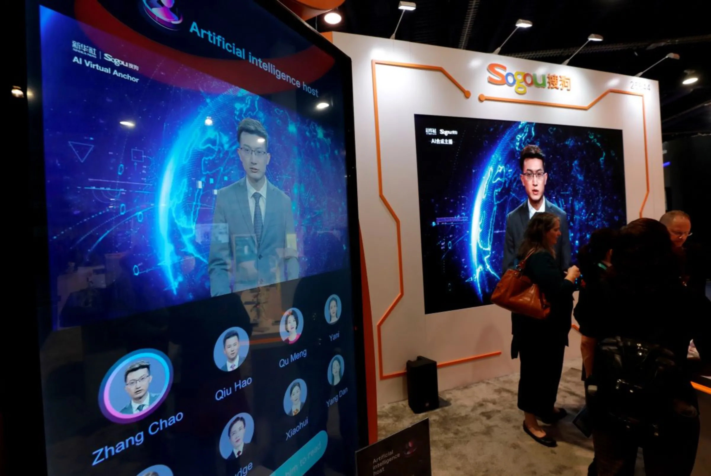 An AI virtual news anchor delivers the news at the Sogou booth during the 2020 CES in Las Vegas, Nevada, U.S. January 8, 2020. REUTERS/Steve Marcus