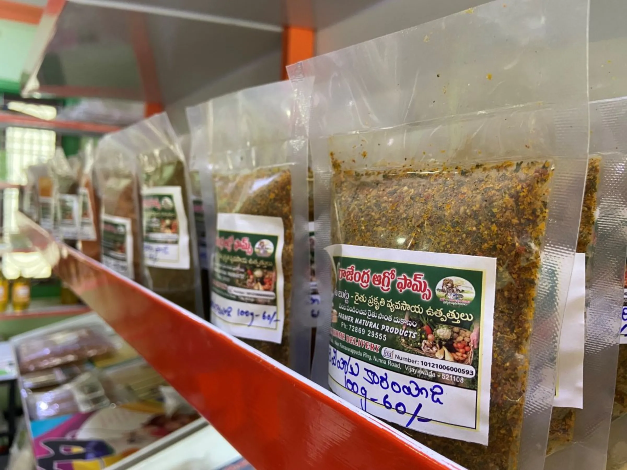 Packets of naturally grown spices at a natural food store in N.T.R District, India, September 2, 2023. Thomson Reuters Foundation/Roli Srivastava