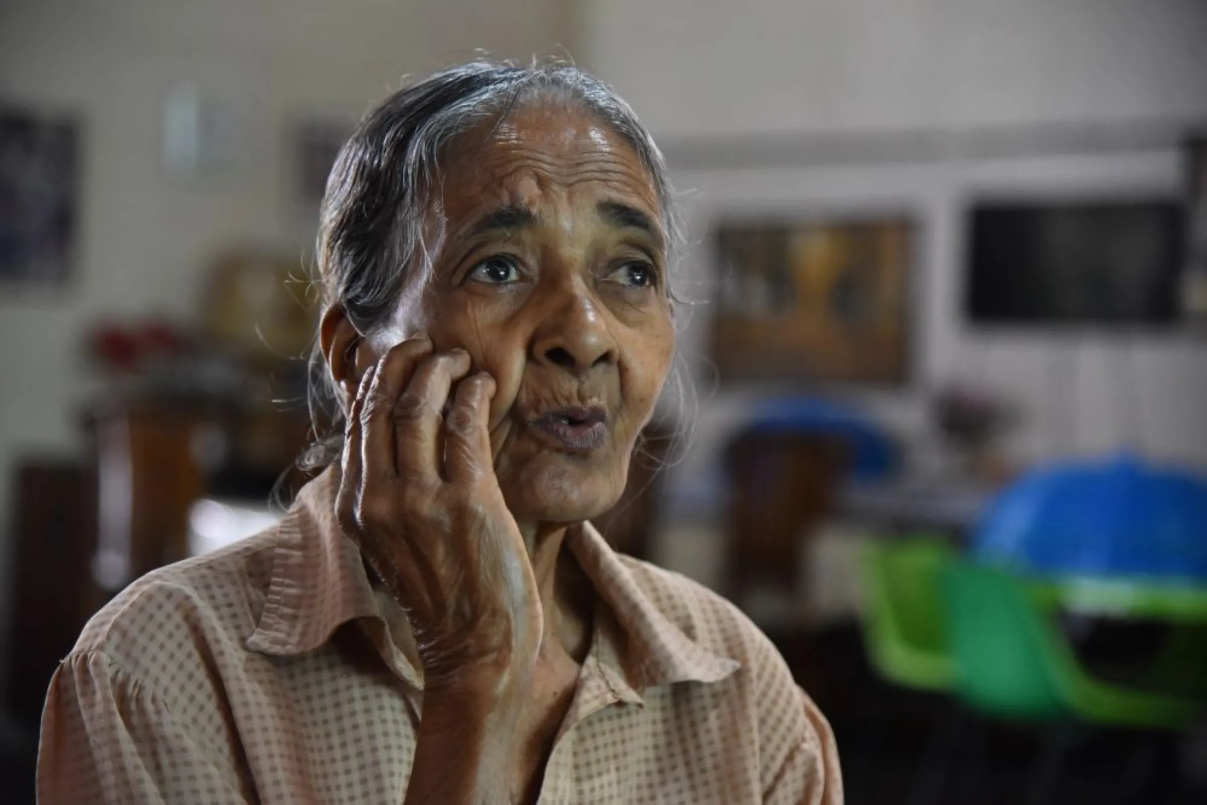 Senior citizen Irene Peiris talks about her worries over her future at an elderly care centre in Ratmalana, Sri Lanka on January 20, 2023
