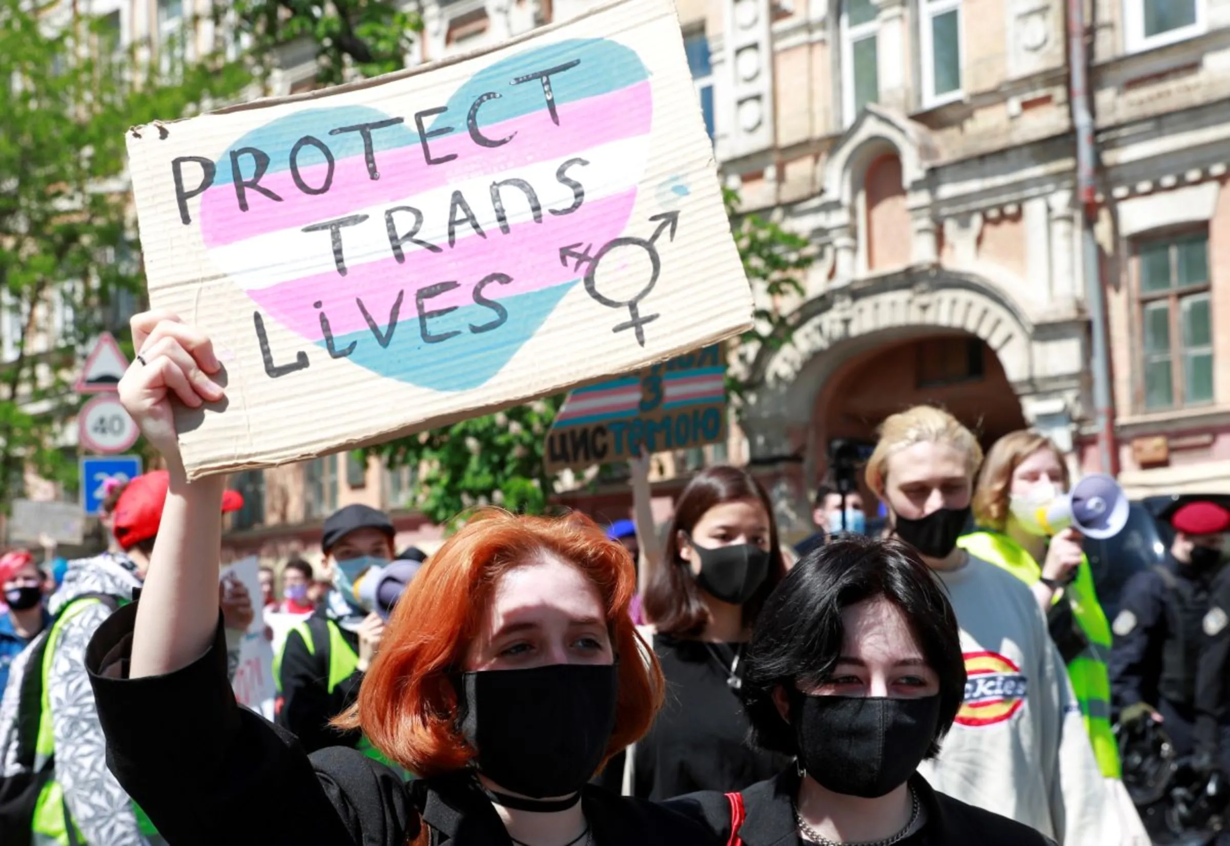 LGBTQ activists march through the city centre during a rally for the rights of transgender people in Kyiv, Ukraine May 22, 2021. REUTERS/Valentyn Ogirenko