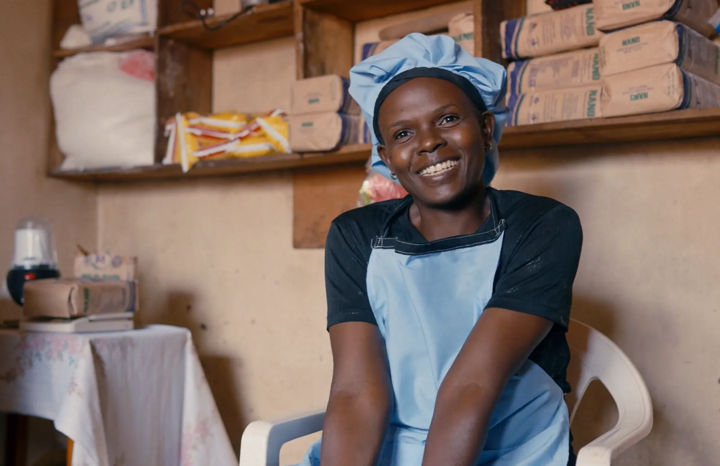 Emily poses for a picture at her bakery in Uganda. Emily is a survivor of human trafficking and was supported in her recovery and rehabilitation by the international charity, Everfree. Everfree/Handout via Thomson Reuters Foundation