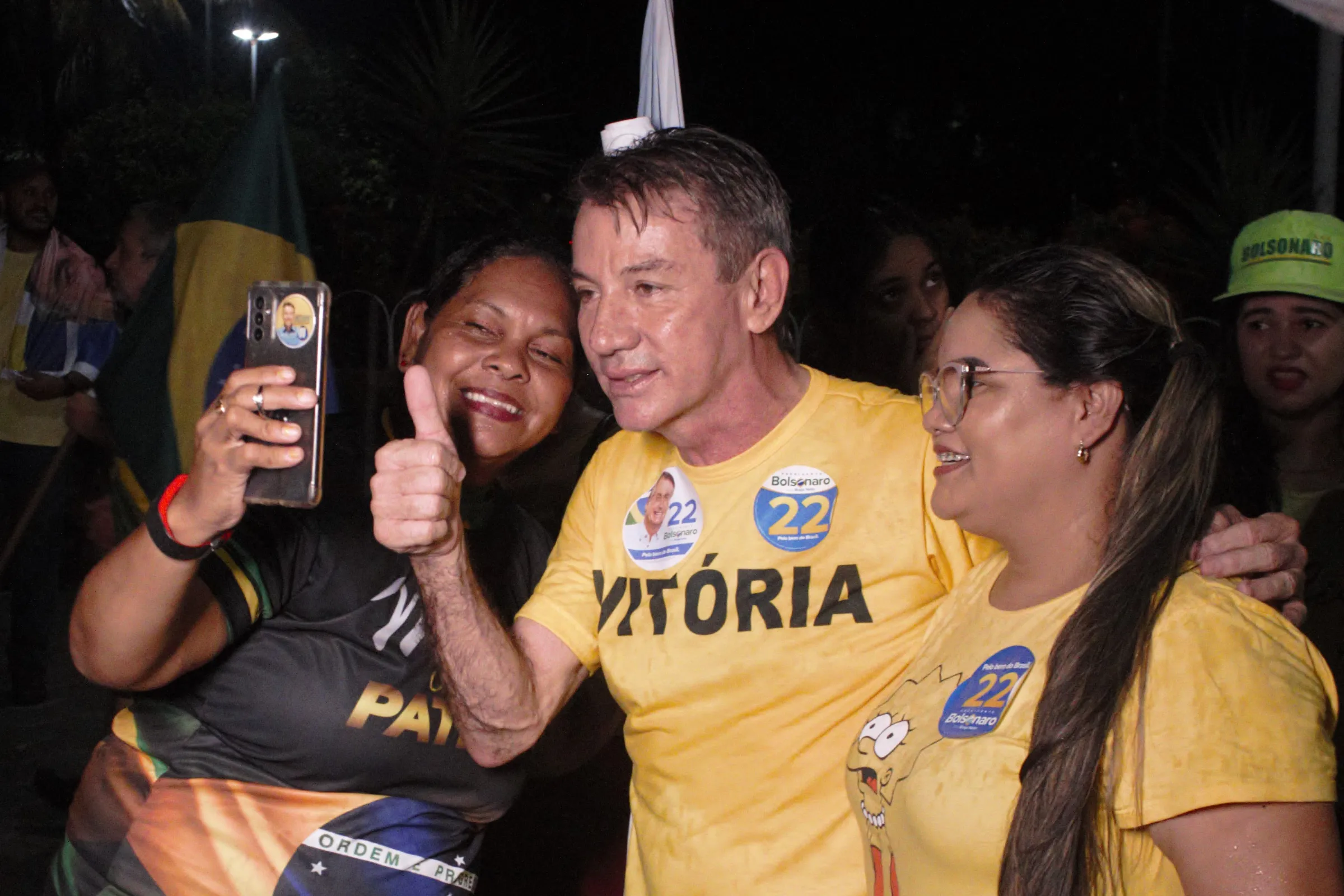 Reelected governor of Roraima Antonio Denarium poses with supporters of Presidency reelection candidate Jair Bolsonaro during a rally in Boa Vista, Brazil, October, 27, 2022. Thomson Reuters Foundation/André Cabette Fábio