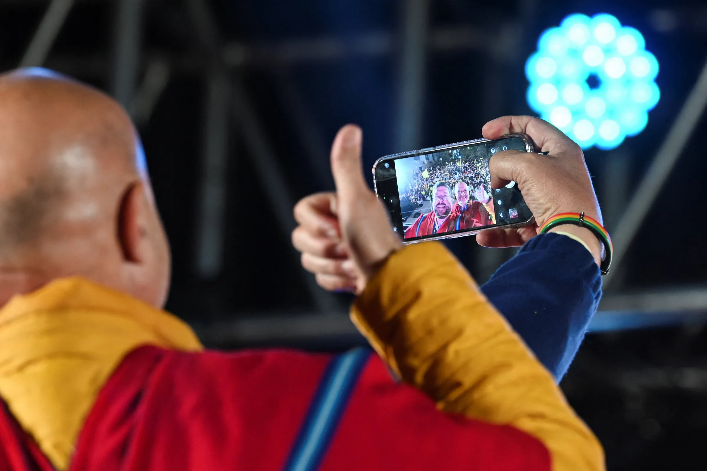 Vice presidential candidate Jose Luis Lupo poses for a selfie next to Samuel Doria Medina, Bolivian center-right businessman and presidential candidate for the National Unity party, at Medina's closing campaign rally, ahead of the August 17 election, in La Paz, Bolivia August 12, 2025. REUTERS/Claudia Morales
