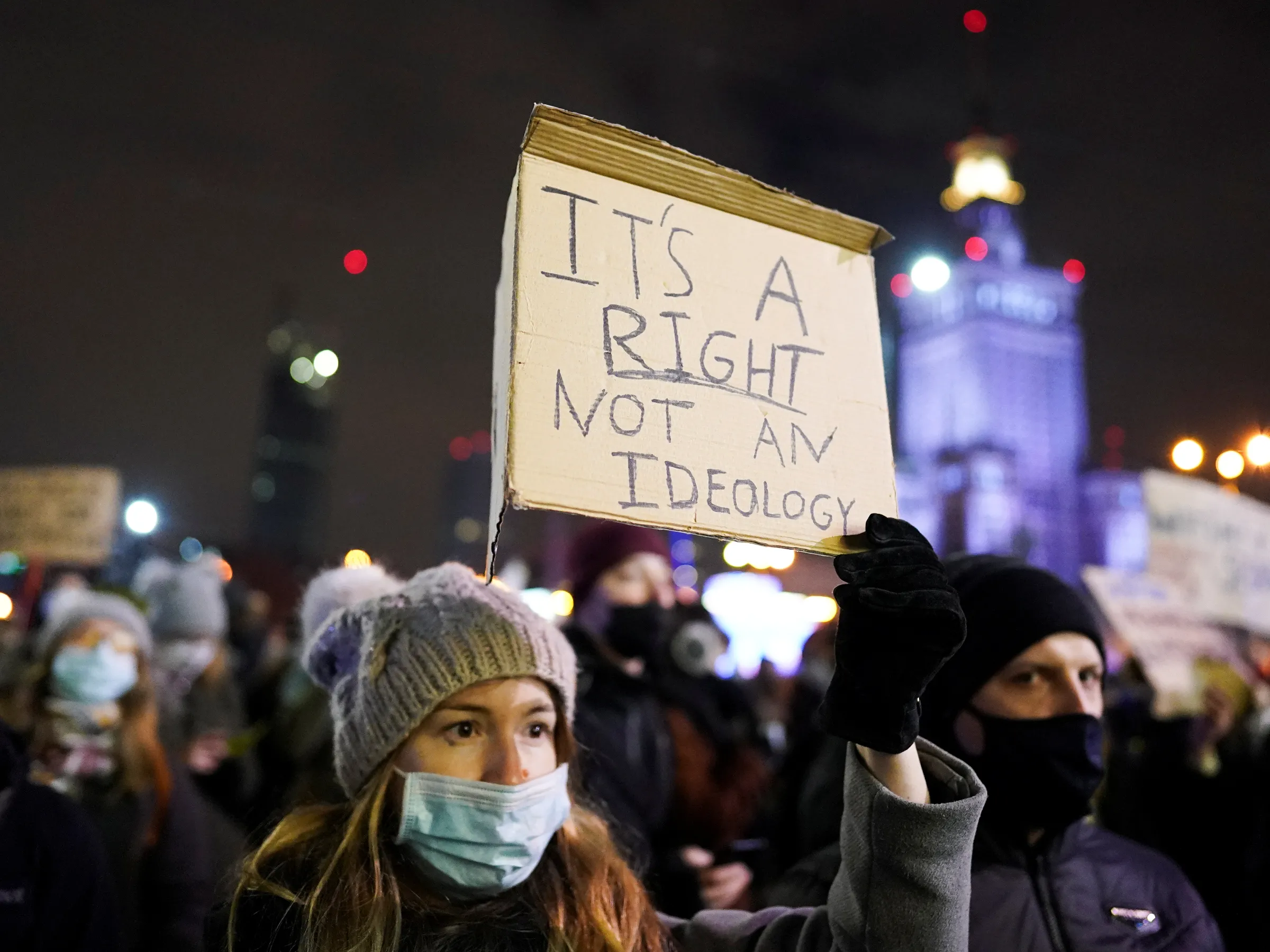 A woman holds a placard during a protest against the verdict restricting abortion rights in Poland