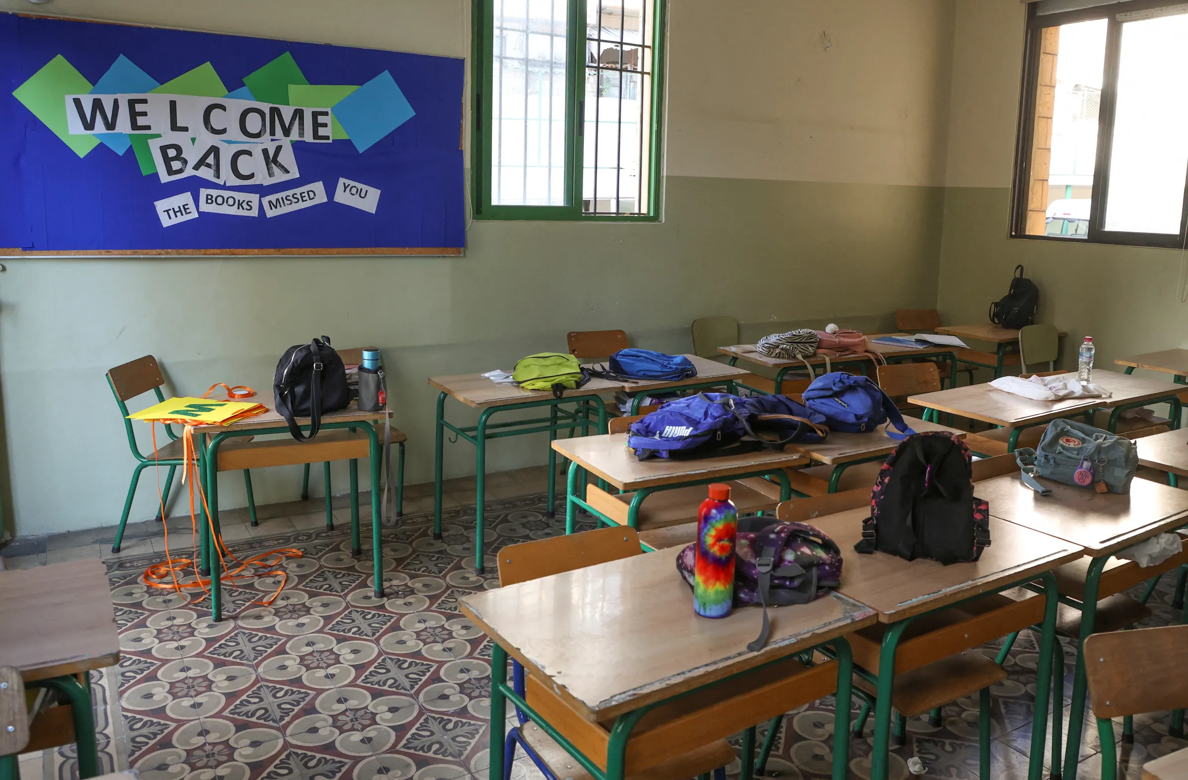 Bags are placed on classroom tables at a private school in Beirut, Lebanon September 22, 2022