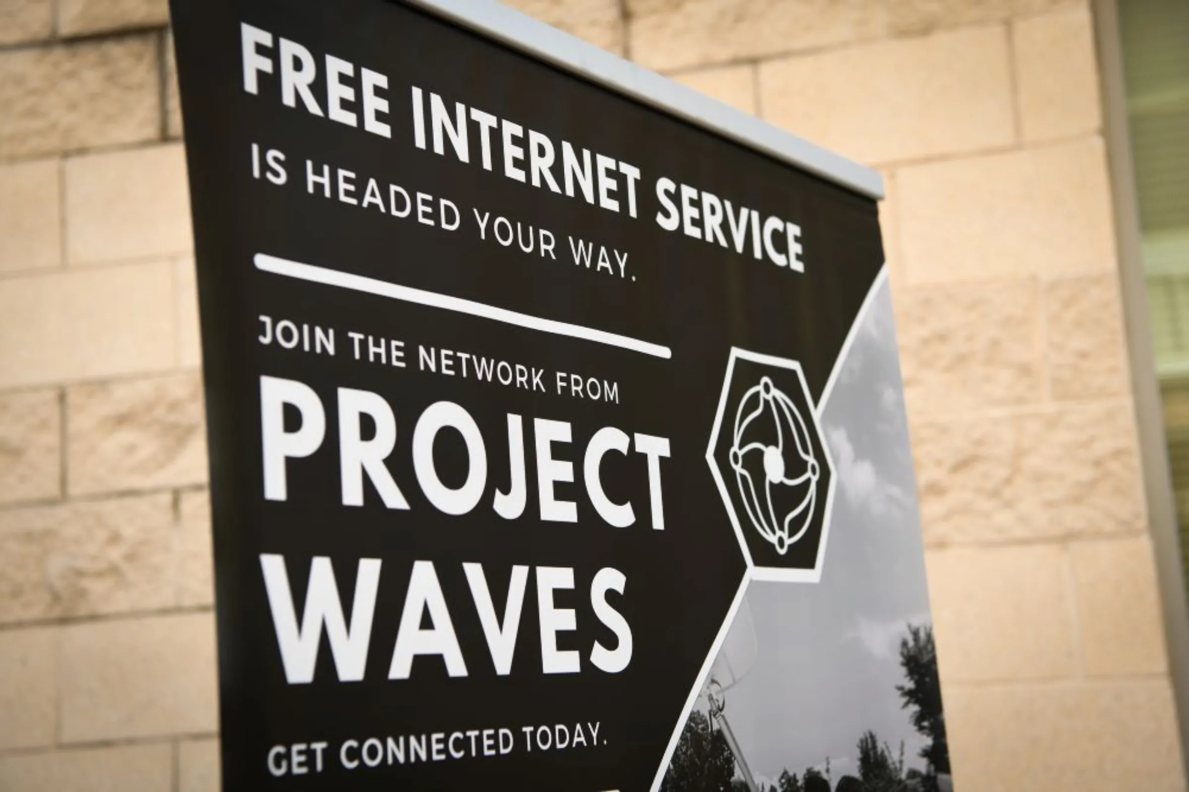 A sign announces a new broadband program at an apartment complex in Baltimore