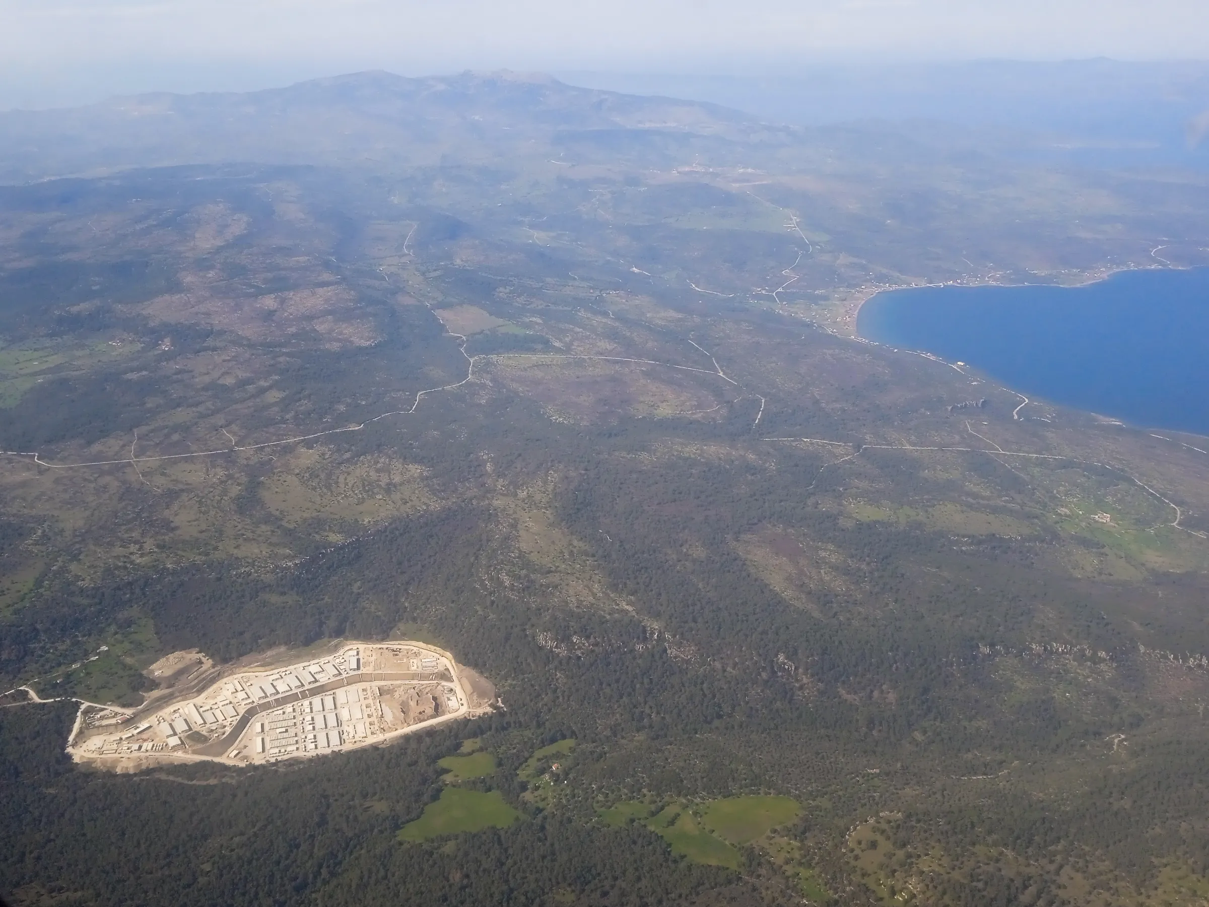 Aerial picture of the Closed Controlled and Access Centre's construction site in Vastria, Lesbos, Greece, February 25, 2024. Marion Bouchetel/Thomson Reuters Foundation